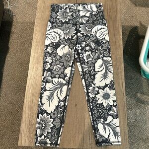 Grey ish blue and white patterned  leggings.